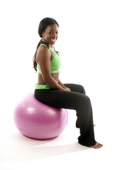 young pretty hispanic african american woman exercising with fit
