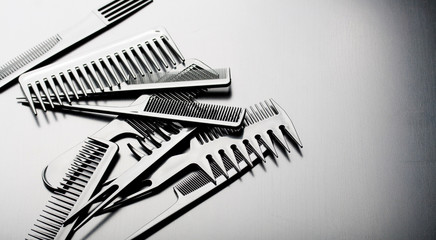 set of combs isolated on black, hairstyle accessories