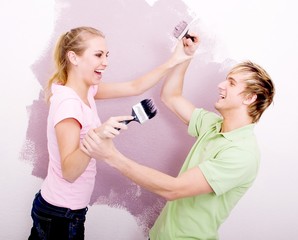 couple joking together with paint