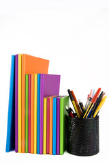 colour notebooks and pen container