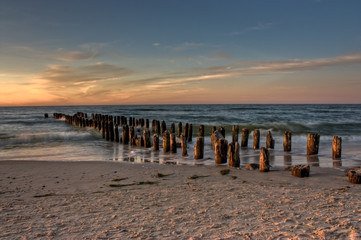 Gold Orange and Pink Sunset on an old pontoon Seaside