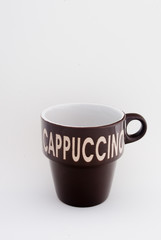 brown cappuccino coffee mug