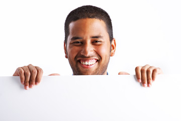 Man Smiling Holding Poster