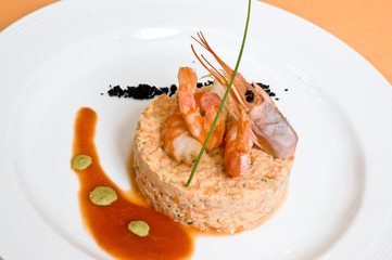 Gourmet seafood with shrimp in restaurant.
