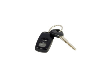 Automobile key with a charm