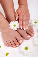 Obraz na płótnie Canvas Spa and wellness theme with beautiful and neat feet
