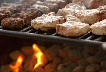 cooking meat on a grill