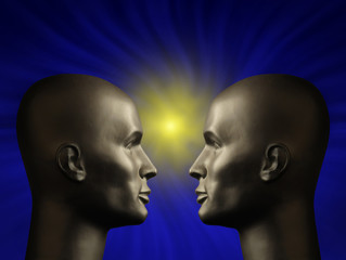 Two android heads facing one another