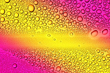 beautiful colorful drops on the glass