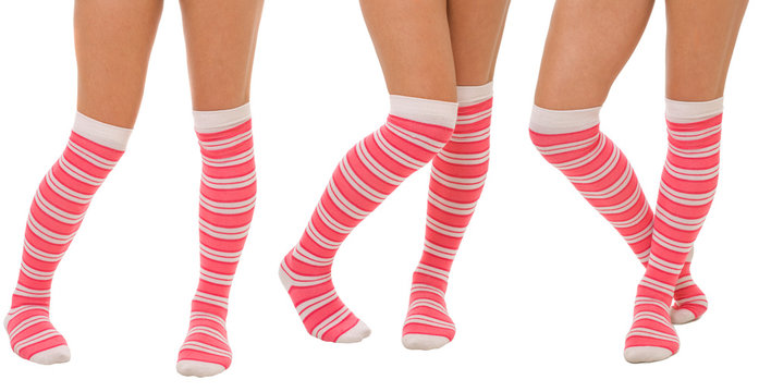 Pairs of women legs in pink socks