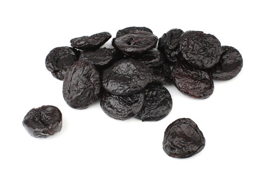 Prunes on a white background.