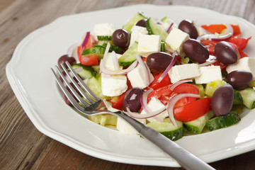 Greek salad on white plate