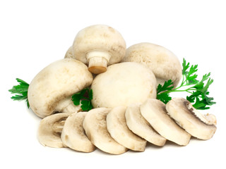 Cut of mushroom champignon with green parsley.Isolated