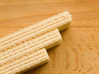Wafers on the wooden background. Shallow DOF.