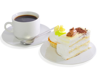 Sponge cakes on plate with cup of coffee . Isolated