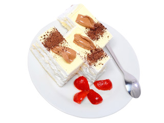 Sponge cakes on plate with strawberry . Isolated