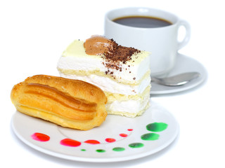 Sponge cakes and custard cake on plate with fruit spots.Isolated