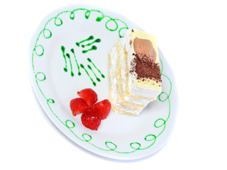 Sponge cakes on plate with strawberry . Isolated