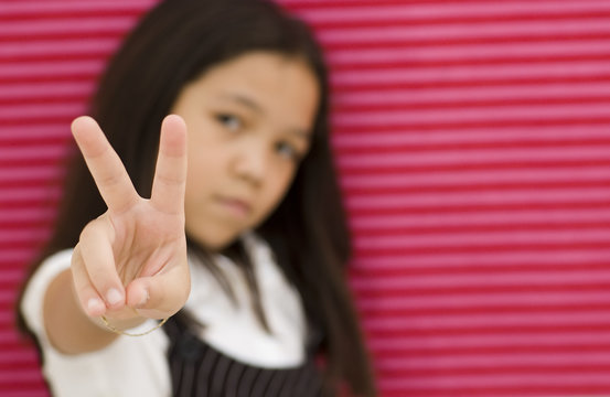 Asian Kid Giving Peace Sign