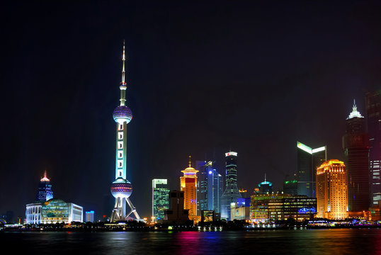 China Shanghai Pudong night skyline with the pearl tower.