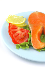 salmon steak on blue dish