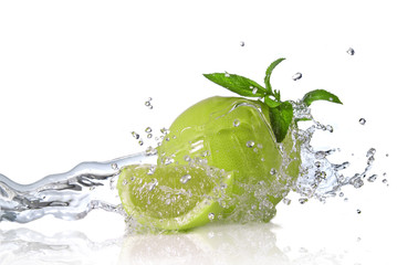 Water splash on lime with mint isolated on white