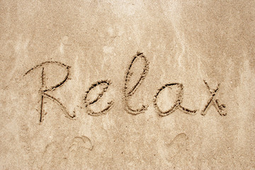 Relax handwritten in sand for natural, symbol,tourism