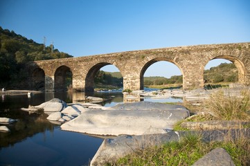 ancient bridge on a river in salamanca