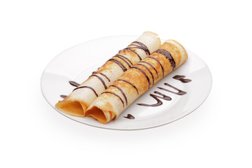 Pancakes with stuffing and chocolate syrup