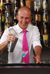 Bartender pouring a drink.