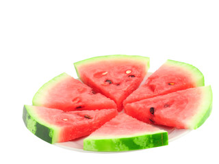 Slice of watermelon on white plate, isolated on white.