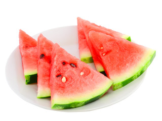 Slice of watermelon on white plate, isolated on white.