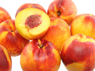 Peaches and cut  of  peach on white background. Isolated
