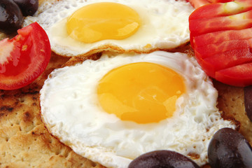 fried eggs on pancake