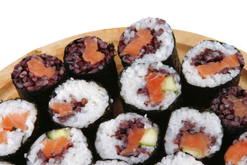 sushi on wooden plate