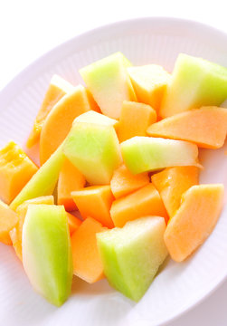 Juicy sliced melon on plate