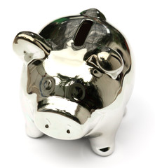 une tirelire cochon argenté