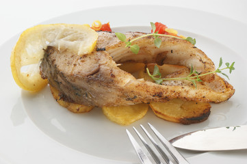 carp on organic potato and healthy vegetable