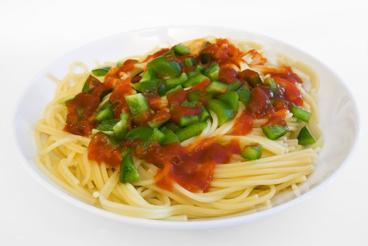 Spaghetti with pepper sauce on plate