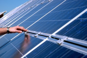 Touching a solar panel