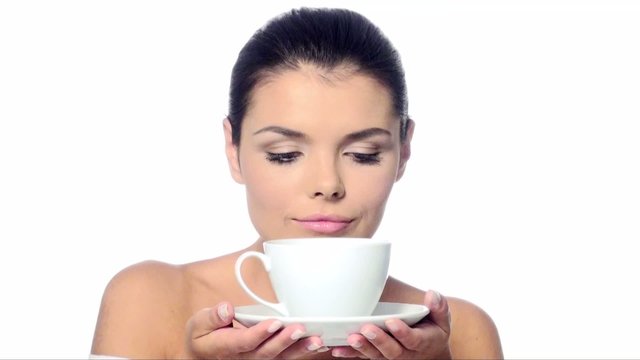 Portrait of beautiful woman with cup of coffee