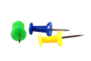 push pins on white background