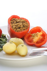 Red mince filled paprika with basil leaf and rice