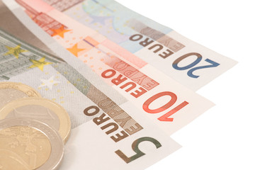 Euro's banknotes and coins on white background