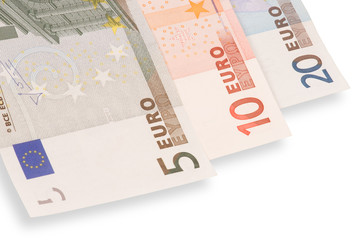 Three euro's banknotes on white background with shadow