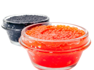 Red and black caviar in glass jars
