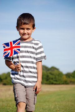 Young boy holding unionjack flag