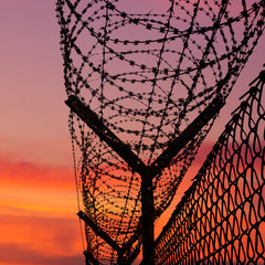 CD cover front - sunset behind a barbwire