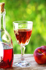 Glass and bottle of rose wine.