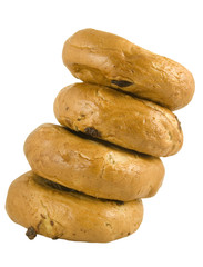 four bagels stacked up isolated on white background